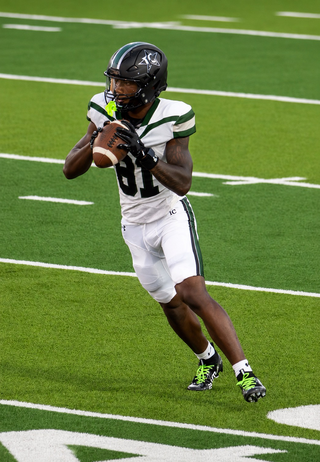 Jayden catching a football at Iowa Colony